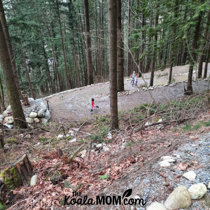 Kids running back down the Stations of the Cross trail.