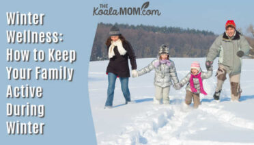 Winter Wellness: How to Keep Your Family Active During Winter. Photo of family having fun in the snow via Depositphotos.
