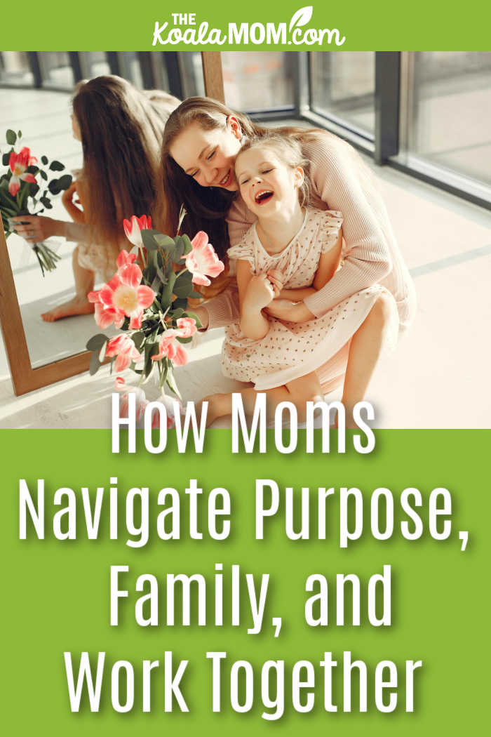 How Moms Navigate Purpose, Family, and Work Together. Photo of mom holding laughing daughter and a bouquet of flowers in front of a mirror by Gustavo Fring via Pexels.